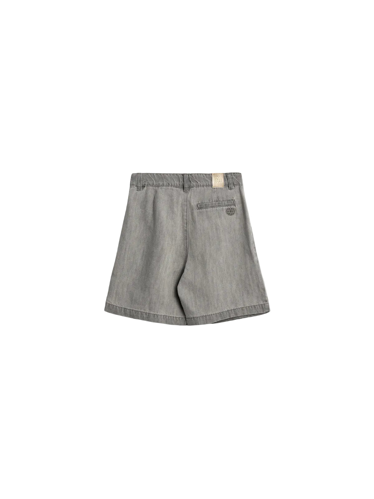 Gray shorts hanging against a neutral background, featuring belt loops and a single back pocket with embroidered design. A small beige tag with an intricate logo is attached at the waistband.