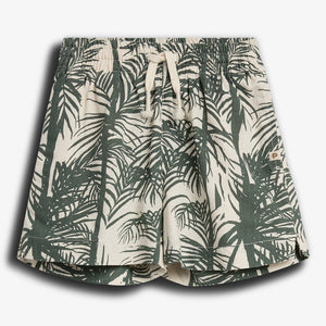 Shorts with a drawstring waistband feature a green palm leaf pattern against a beige background, positioned on a plain white surface.