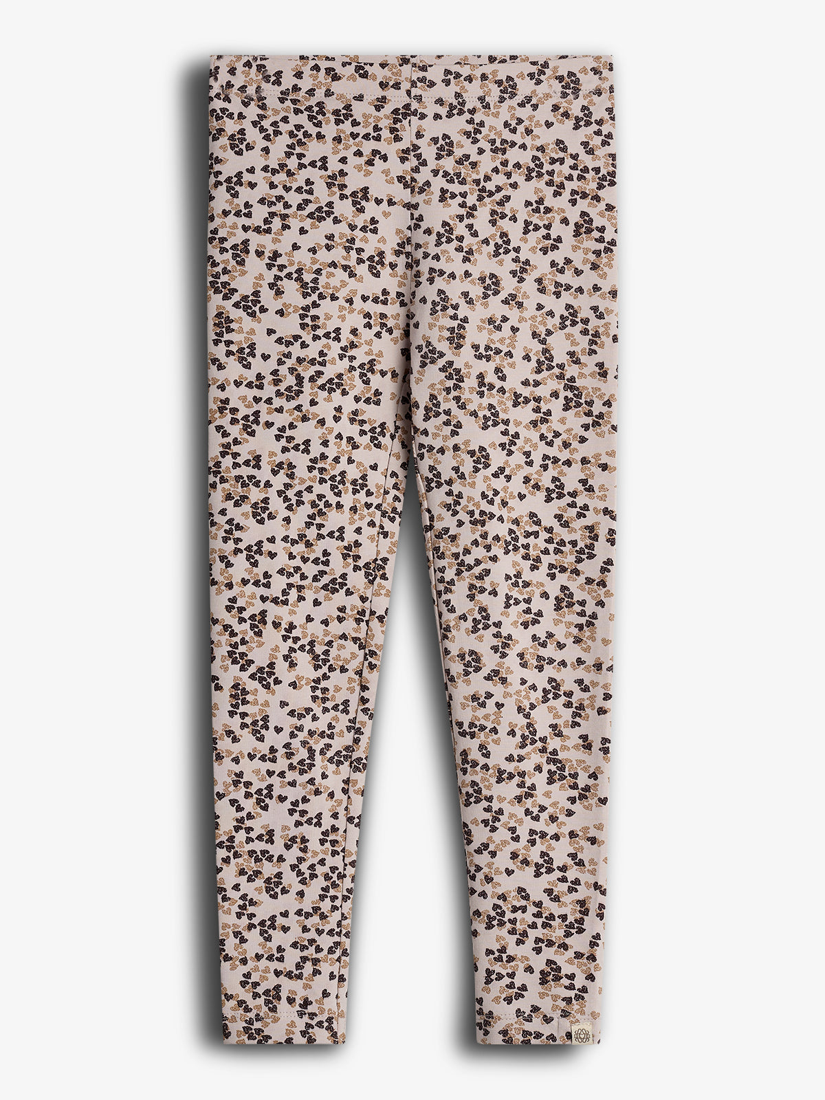 Een legging met een bloemenpatroon, uitgestrekt en plat liggend. De kleur is lichtroze met bruine en zwarte bloemaccenten op een witte achtergrond.