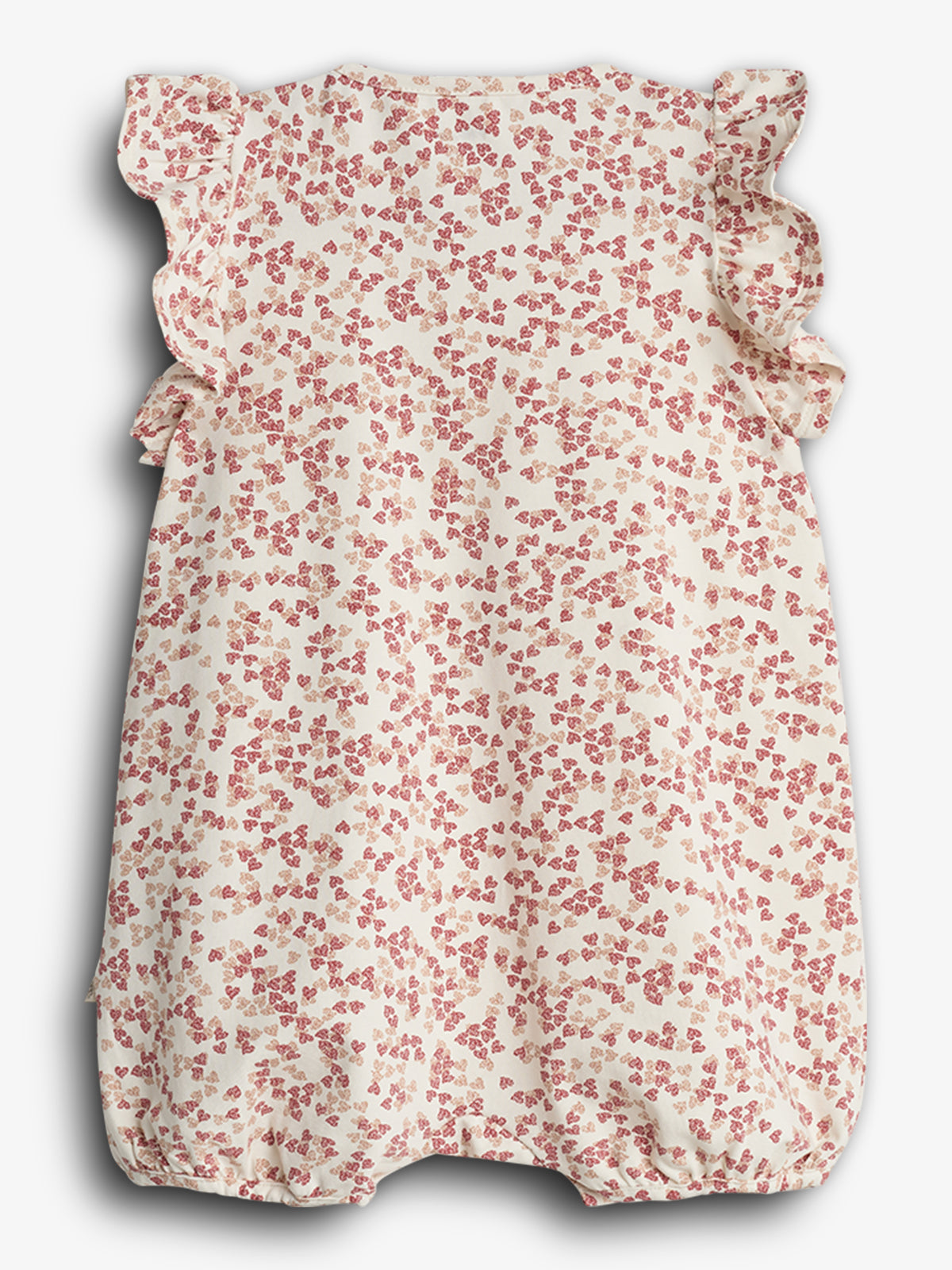 Een babyjurk met roze bloemmotief en geplooide mouwen. Het kledingstuk hangt tegen een witte achtergrond, waardoor de delicate patronen en details goed zichtbaar zijn.