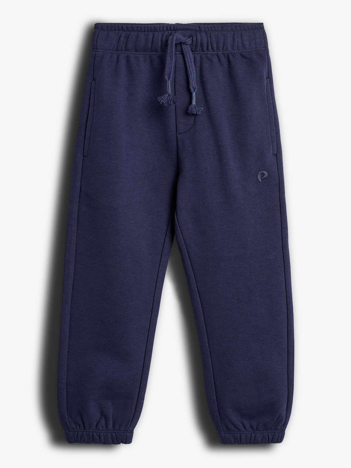 Navy blue sweatpants hang against a plain white background. They feature an elastic waistband with a drawstring, side pockets, and elastic cuffs at the ankles.