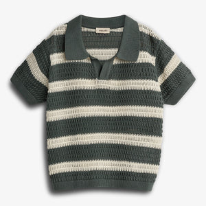 A short-sleeved, collared green and white striped knit sweater displayed on a flat white background. The texture is waffle-knit, giving it a casual yet structured appearance. A label reads "smallable."
