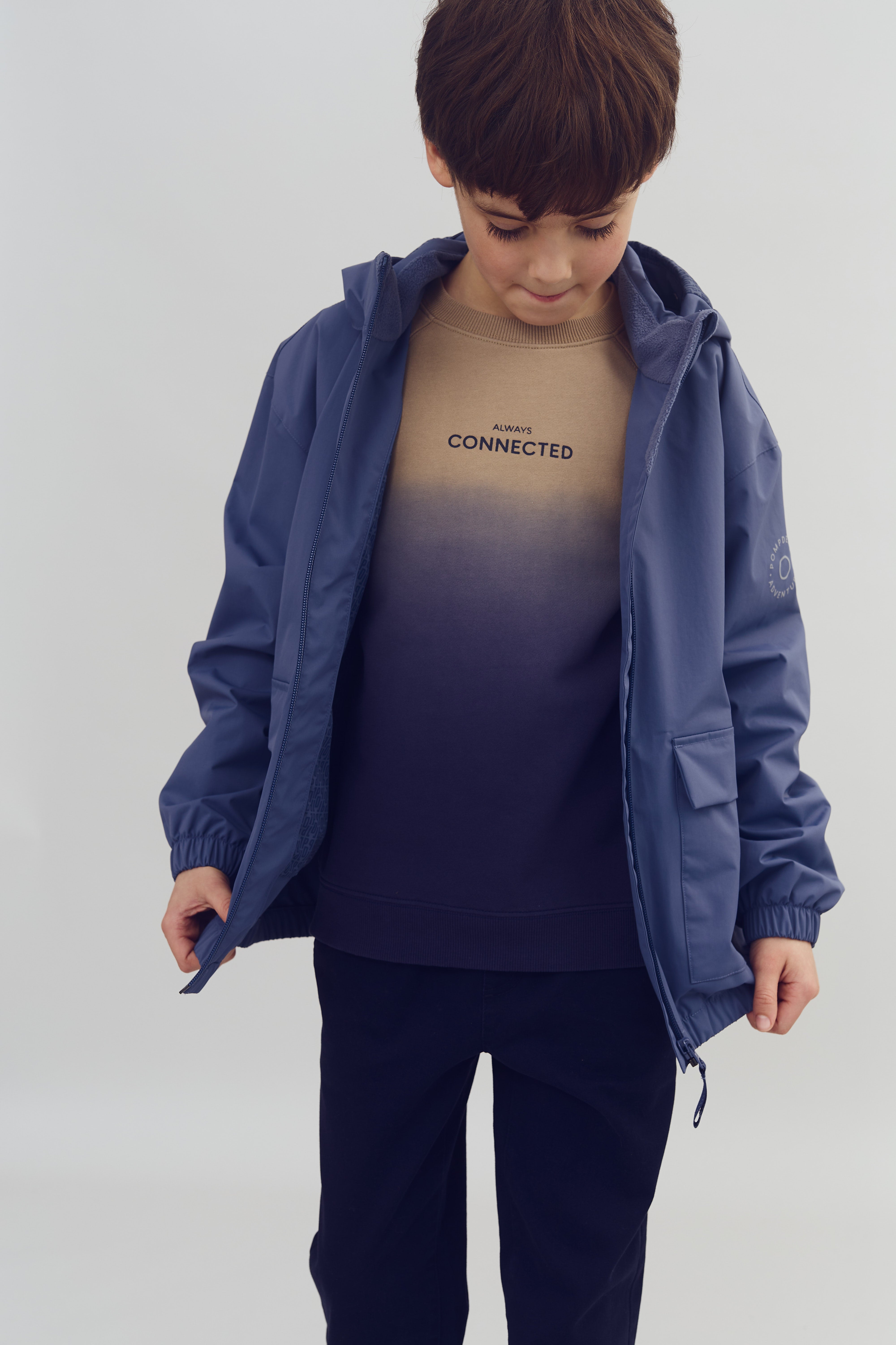 Regenjas met opgezette zak - Tweens - Vintage Blue